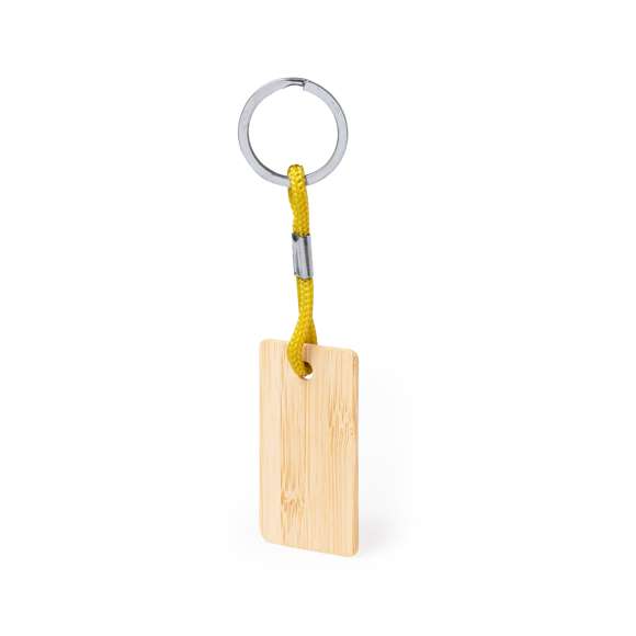 Práctico llavero rectangular, fabricado en bambú, con cordón en variados colores. Es ideal para el marcaje en láser. Materiales como el bambú fomentan la utilización de materias primas naturales, reduciendo las emisiones contaminantes. Proviene de una planta de gran resistencia y versatilidad, con crecimiento y regeneración rápidos, siendo una excelente alternativa al uso de madera tradicional.