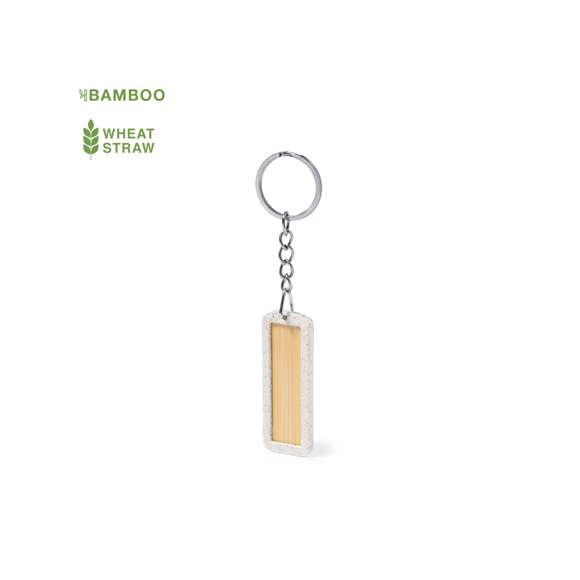 Llavero eco fabricado en bambú con marco en caña de trigo. De forma rectangular y con amplia zona de marcaje. La caña de trigo fomenta la utilización de materias primas naturales, reduciendo así las emisiones contaminantes.