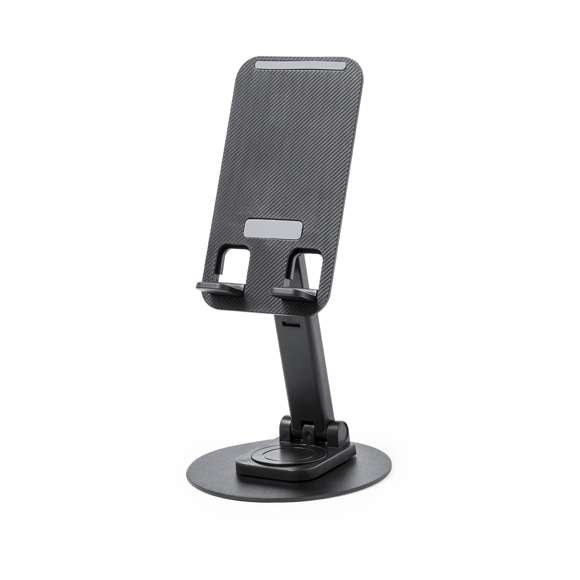 Soporte plegable para smartphone y tablet, fabricado en resistente aluminio y ABS. Regulable en altura, con almohadillas de goma antideslizantes en base y soporte. En sobrio acabado de color blanco o negro, y con amplia superficie de marcaje. Presentado en atractiva caja de diseño.