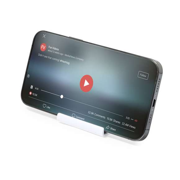 Soporte para smartphone y tablet fabricado en resistente ABS. De diseño compacto y plegable para poder llevarlo a cualquier lado. Con distintas posiciones de inclinación y almohadillas de sujeción. Presentado en bolsa individual reciclada.