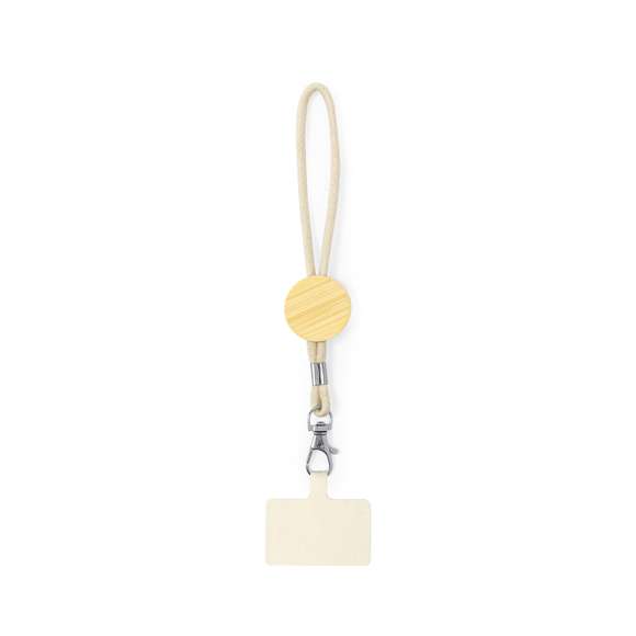Original pulsera portamóvil en suave algodón, adaptable a todo tipo de muñecas. Con accesorio de transporte para situar entre la funda y el smartphone. Pieza central de bambú para personalización, especial para grabado en láser. Presentado individualmente en bolsa de papel reciclado.Materiales como el bambú fomentan la utilización de materias primas naturales, reduciendo las emisiones contaminantes. Proviene de una planta de gran resistencia y versatilidad, con crecimiento y regeneración rápidos, siendo una excelente alternativa al uso de madera tradicional.