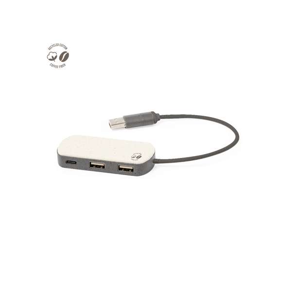 Puerto USB 2.0 fabricado en fibra de café. Con conexión dual USB/Tipo C y 3 puertos: uno con conexión Tipo C y 2 puertos USB. Con logotipo fibra de café y una amplia superficie de marcaje. Presentado en caja individual de diseño kraft.La fibra de café es una solución circular que se obtiene de la utilización de los residuos producidos en la obtención del café. Una alternativa sostenible que favorece la reducción del uso de plásticos, ahorrando energía en su proceso de fabricación y contribuyendo al cuidado del medio ambiente.