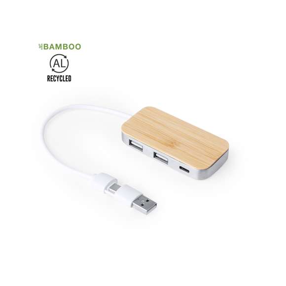 Puerto USB 2.0 fabricado en Aluminio Reciclado con superficie en bambú. Incluye puerto Tipo C y 2 puertos USB, con entrada dual USB/Tipo C. Presentado en caja individual de diseño kraft.Fabricado conforme a estándares RoHS, con sistema de bloqueo para evitar cortocircuitos.El Aluminio Reciclado es un material con posibilidades de reciclaje casi infinitas, sin perder sus propiedades originales y consumiendo menos energía en este proceso.Certificación GRS (Global Recycled Standard / Estándar de Reciclaje Global), que garantiza el origen reciclado del material usado para fabricar el producto.Materiales como el bambú fomentan la utilización de materias primas naturales, reduciendo las emisiones contaminantes. Proviene de una planta de gran resistencia y versatilidad, con crecimiento y regeneración rápidos, siendo una excelente alternativa al uso de madera tradicional.