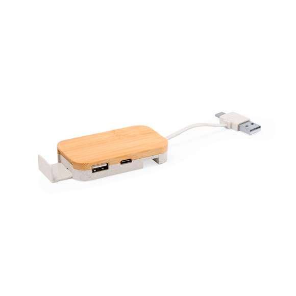 Puerto USB 2.0 con soporte para móvil extraíble integrado en la base. Parte superior del dispositivo fabricada en bambú, con base en caña de trigo. Con conexión dual USB/Tipo C y 3 puertos: 1 puerto Tipo C y 2 puertos USB. Presentado en caja individual de diseño kraft.La caña de trigo fomenta la utilización de materias primas naturales, reduciendo así las emisiones contaminantes.Materiales como el bambú fomentan la utilización de materias primas naturales, reduciendo las emisiones contaminantes. Proviene de una planta de gran resistencia y versatilidad, con crecimiento y regeneración rápidos, siendo una excelente alternativa al uso de madera tradicional.Fabricado conforme a estándares RoHS, con sistema de bloqueo para evitar cortocircuitos.
