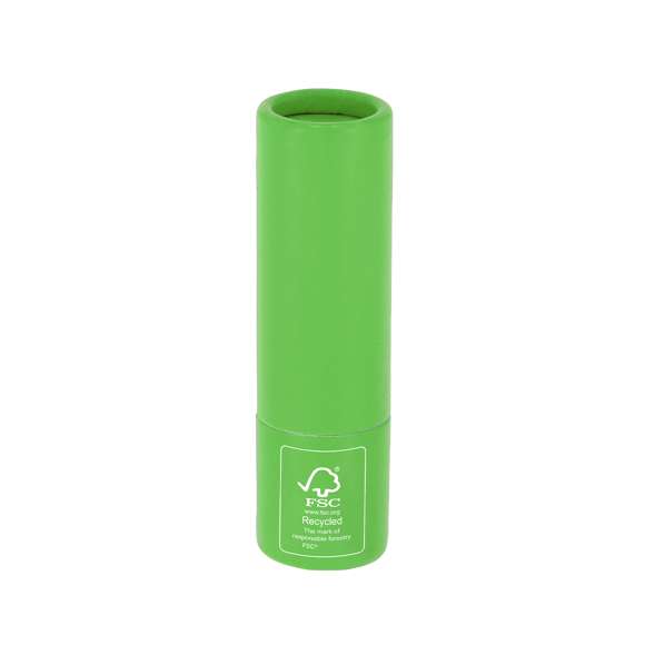 Bálsamo labial fabricado en cartón reciclado con certificado FSC. Aroma vainilla. Protección SPF15. Dermatológicamente testado. Distintivo FSC sobre el envase.