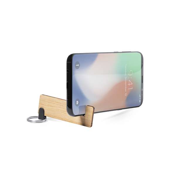Llavero soporte para smartphone y tablet de línea nature, hecho en bambú procedente de cortes naturales. De fabricación europea.