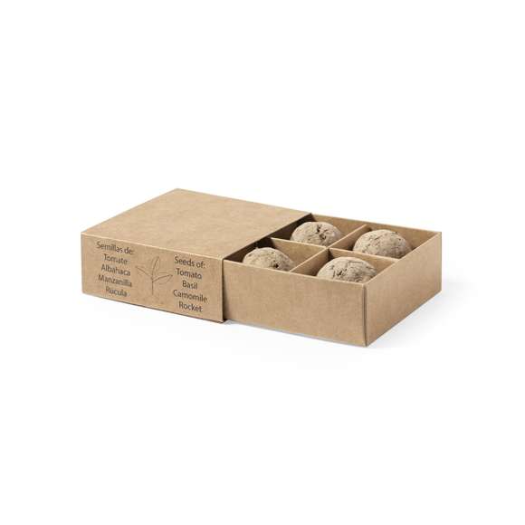 Kit huerto con semillas de tomate, albahaca, rúcula y manzanilla. Presentado en estuche de cartón reciclado con instruciones de plantado, distintivo Made in Europe y con 4 compartimentos independientes.