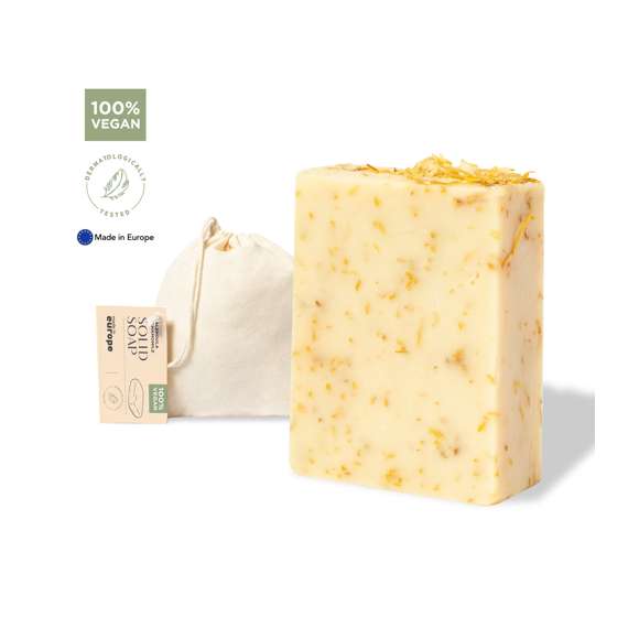  	Pastilla de jabón vegano de 100 gr. Aroma de caléndula y manzanilla  con propiedades calmantes, hidratantes y reparadoras. Dermatológicamente testado y de fabricación europea. Presentación en bolsa individual de algodón, con cierre de cordón y etiqueta distintiva. 	 	Producto sostenible y 100% vegano, sin ingredientes de procedencia animal. Además, no se han realizado pruebas de estos productos en animales, promoviendo el cuidado y respeto de todos ellos.