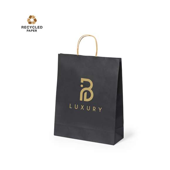 Bolsa de línea nature, fabricada en papel reciclado acabado en negro de 100g/m2, con asas cortas reforzadas en tono natural y fuelle. Resistencia hasta 6 kg de peso.
