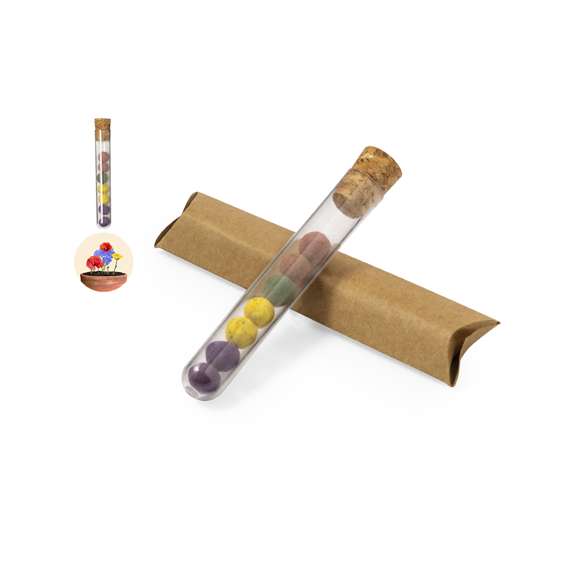 Set de bombón con semillas presentado en recipiente de plástico con tapón de corcho. Este kit de huerto contiene semillas de albahaca, hinojo, perejil y orégano. Presentado y protegido dentro de un sobre de cartón reciclado con instrucciones de plantado.
