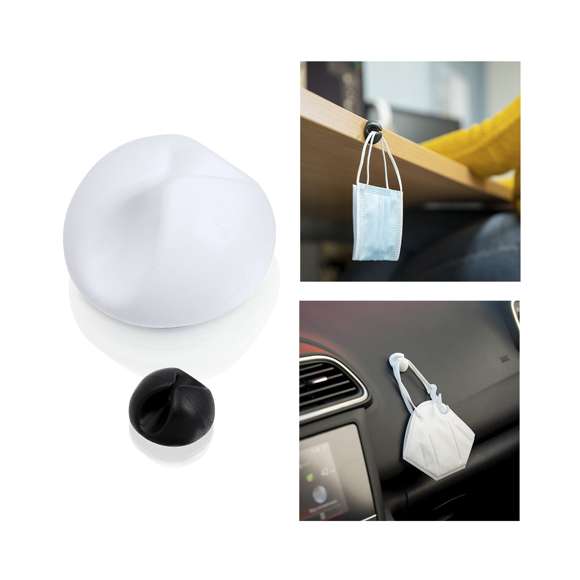  	Soporte adhesivo multifunción en suave caucho. Válido como soporte para mascarillas, lanyards, soporte para cables… Disponible en acabados blanco y negro.