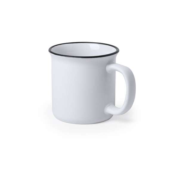 Taza de cerámica de 300ml de capacidad con diseño vintage. En sobrio diseño bicolor, con anilla en el borde. Presentada en caja individual.Disponible manual de instrucciones en español e inglés.