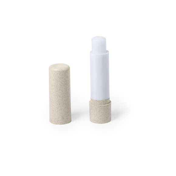 Barra de bálsamo labial de línea nature, fabricada en fibra de bambú. Tipo SPF15, con aroma vainilla y disponible en colores natural y verde eco.