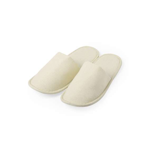 Zapatillas unisex en algodón/poliéster. Confortable interior acolchado y pespuntes de refuerzo. Talla única 36-43, disponibles en color natural.