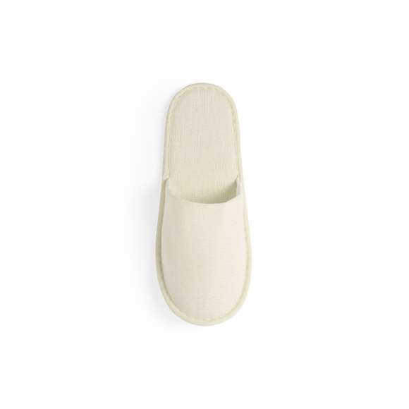 Zapatillas unisex en algodón/poliéster. Confortable interior acolchado y pespuntes de refuerzo. Talla única 36-43, disponibles en color natural.