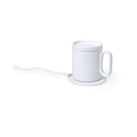 Calentador de tazas con cargador inalámbrico integrado de carga rápida -10W-. Con taza de cerámica de 350 ml, especialmente diseñada para calentar y mantener la temperatura de la bebida, con tapa a juego. Incluye cargador de pared y cable de carga Tipo C. Set presentado en atractiva caja de diseño.