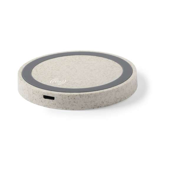 Cargador inalámbrico circular de línea nature. Carcasa en caña de trigo, para así fomentar la utilización de materias primas naturales y reducir las emisiones contaminantes. Con base antideslizante e indicador LED de estado de carga. Compatible con smartphones con tecnología de carga inalámbrica y presentado en atractiva caja de diseño eco.