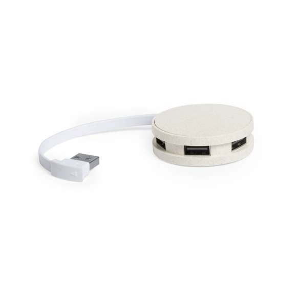 Original y compacto puerto USB de forma redondeada de línea nature. Carcasa en caña de trigo, para así fomentar la utilización de materias primas naturales y reducir las emisiones contaminantes. Con 4 puertos USB 2.0 para conectar multitud de dispositivos y amplia superficie de marcaje. Presentado en caja individual de diseño eco.