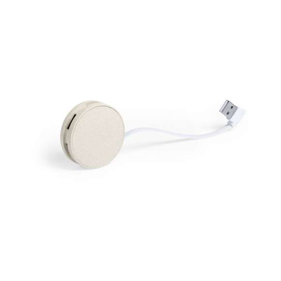 Original y compacto puerto USB de forma redondeada de línea nature. Carcasa en caña de trigo, para así fomentar la utilización de materias primas naturales y reducir las emisiones contaminantes. Con 4 puertos USB 2.0 para conectar multitud de dispositivos y amplia superficie de marcaje. Presentado en caja individual de diseño eco.