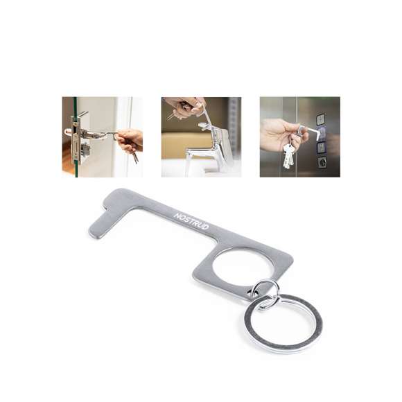 Llavero higiénico anti-contacto, fabricado en resistente acero inox. Especialmente diseñado para evitar tocar con las manos superficies de uso común (picaportes de puertas, interruptores, grifos de uso público, cajeros automáticos...). Con cómodo troquel para el dedo y presentado en bolsita individual. Recomendado para marcaje en láser.
