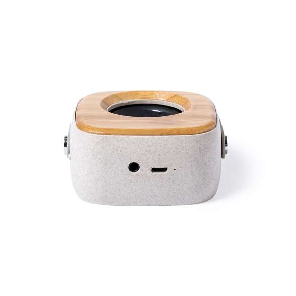  	Altavoz Bluetooth en combinación de piezas de bambú de corte nature y carcasa en caña de trigo, para así fomentar la utilización de materias primas naturales y reducir las emisiones contaminantes. 	 	De tamaño compacto y con práctica asa de transporte en suave silicona, se convierte en un complemento perfecto para el smartphone. Conexión Bluetooth® 5.0 y 3W de potencia, con entrada de línea jack 3,5mm (cable incluido). Compatible con iOS y Android, incluye cable de carga micro USB y viene presentado en atractiva caja de diseño. Disponible manual de instrucciones español e inglés.