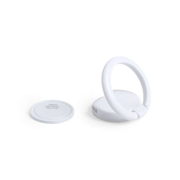Soporte antibacteriano con adhesivo 3M extra fuerte. Ideal para smartphone, con moneda para carro integrada y anilla posterior 360º para el dedo, válida como soporte y accesorio para selfies.Los productos con tratamientos antibacterianos son capaces de reducir drásticamente las cargas bacterianas presentes en las superficies de los materiales, gracias a la incorporación de agentes microbianos permanentes estáticos, con alta efectividad para inhibir y prevenir la contaminación bacteriana.Artículo de acuerdo al estándar ISO 22196, que determina la actividad antibacteriana en materiales plásticos y superficies no porosas, lo que permite conocer la efectividad de inhibición microbiana que tienen los aditivos sobre los objetos tratados mediante una evaluación cuantitativa.