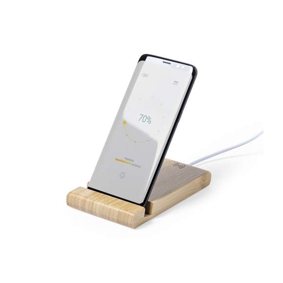Cargador inalámbrico 15W de línea nature, con soporte integrado para smartphones y tablets. Carcasa en bambú procedente de cortes naturales. Incluye cable micro USB de 1m y es compatible con dispositivos equipados con tecnología de carga inalámbrica. Con amplia superficie de marcaje, presentado en atractiva caja de diseño eco.