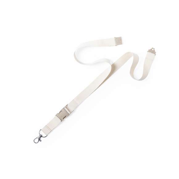 Lanyard de línea nature en material 100% algodón. Hebilla y cierre de seguridad en cuello de caña de trigo/PP, para así fomentar la utilización de materias primas naturales y reducir las emisiones contaminantes. Con mosquetón metálico giratorio y disponible en color natural.