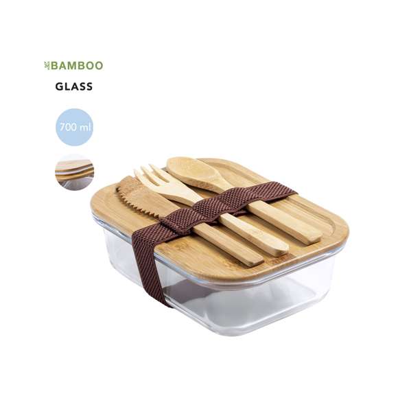 Fiambrera de línea nature de 700 ml de capacidad. Fabricada en cristal, con tapa hermética de bambú pulido, con banda de goma para evitar derrames y rebaje para usarla como bandeja. Incluye cinta de seguridad con tenedor, cuchara y cuchillo. Presentada en atractiva caja individual de diseño eco.