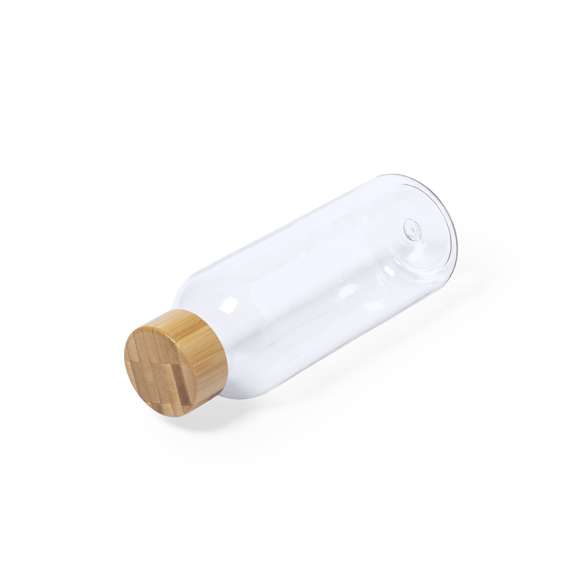 Bidón de línea nature y 600ml de capacidad. Libre de BPA, con cuerpo en RPET, elaborado a partir de plástico reciclado para así fomentar la reutilización de residuos plásticos y contribuir a la sostenibilidad del planeta. Con tapón a rosca en bambú.