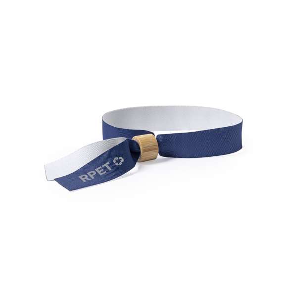 Pulsera para eventos de línea nature. Fabricada en poliéster RPET de 160g/m2, elaborado a partir de plástico reciclado para así fomentar la reutilización de residuos plásticos y contribuir a la sostenibilidad del planeta. Con ajustador en bambú y disponible en variada gama de colores, color blanco especialmente diseñado para sublimación. Distintivo RPET impreso en la pulsera.