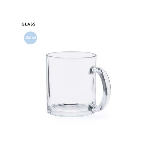 Taza transparente de cristal de 350 ml de capacidad y con asa a juego. Presentada en caja individual de diseño kraft.