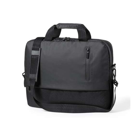 Maletín de Antonio Miró de calidad premium en resistente poliéster 600D. De sobrio diseño y con compartimento acolchado para portátil de hasta 15 pulgadas. Con cómoda asa de transporte reforzada, cierres de cremallera con tiradores metálicos y bolsillo frontal. Logotipo de la marca en frontal.