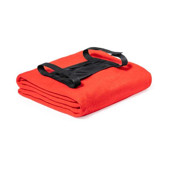 Manta de 130x160cm en variada gama de vivos colores. En material polar fleece anti-pilling de 200g/m2 y con asa de transporte de cierre de velcro en suave poliéster.