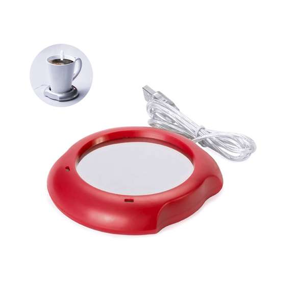 Calentador de tazas con conexión USB y de superficie metálica, especialmente diseñada para mantener el calor. De elegante diseño en color gris y compatible con tazas de hasta 7,4cm de diámetro, incorpora interruptor en la parte trasera y luces de estado. Presentada en caja individual.