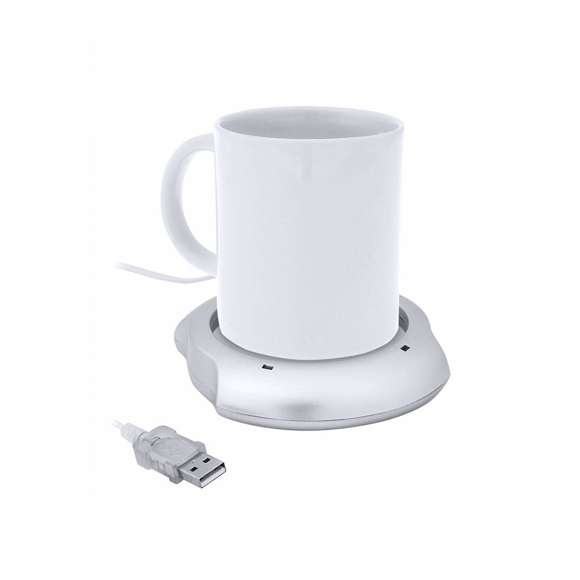 Calentador de tazas con conexión USB y de superficie metálica, especialmente diseñada para mantener el calor. De elegante diseño en color gris y compatible con tazas de hasta 7,4cm de diámetro, incorpora interruptor en la parte trasera y luces de estado. Presentada en caja individual.