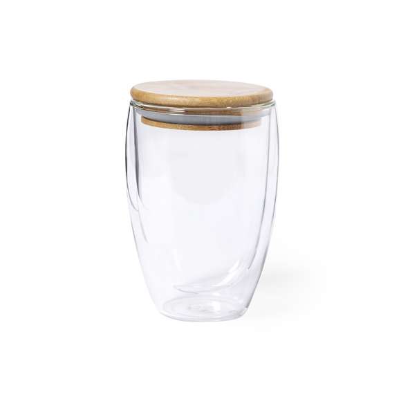 Vaso térmico de línea nature en alta calidad, de doble pared y 350ml de capacidad. Fabricado en cristal de borosilicato, que ofrece una resistencia y durabilidad excepcionales, alargando su vida útil y pudiendo ser reutilizado infinidad de veces. Tapa en bambú y presentado en atractiva caja de diseño eco.