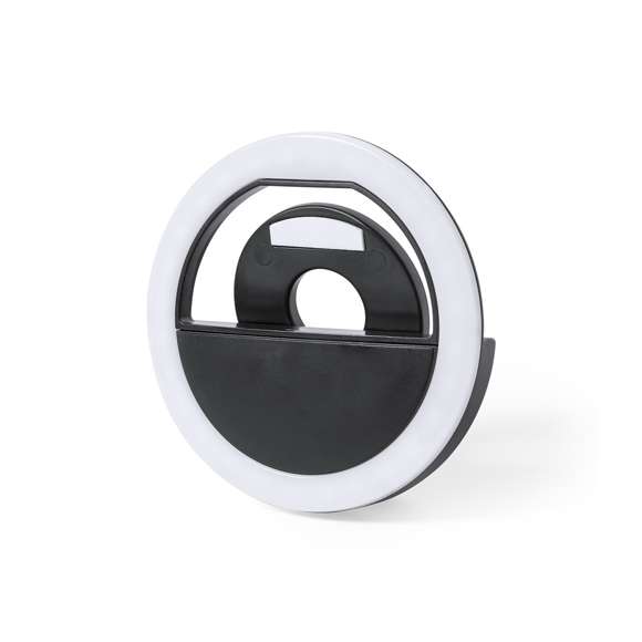 Anillo de luz led con acople para smartphone, fabricado en resistente ABS. 28 ledes, con 3 niveles de intensidad y recargable por USB (cable Micro USB incluido). Presentado en atractiva caja de diseño. Disponible manual en español e inglés.