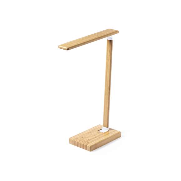 Lámpara cargador plegable de línea nature. Fabricada en bambú procedente de cortes naturales y con base antideslizante. Cargador inalámbrico 10W integrado. Incluye 25 LEDs y 3 posiciones de iluminación (cálida, fría y media) e intensidad regulable. Incluye temporizador de 1H y 2H para la luz  y una salida USB. Compatible con dispositivos móviles de carga inalámbrica, con cable cargador tipo C y viene presentada en una atractiva caja de diseño eco. Disponible manual de instrucciones en español e inglés.