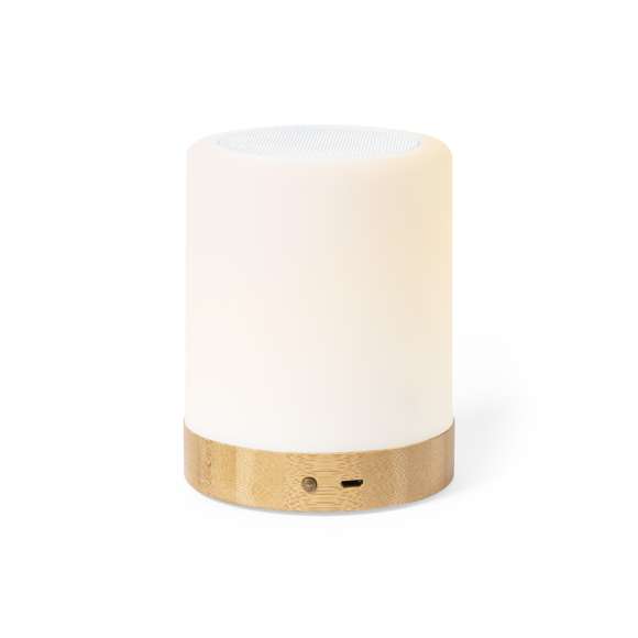 Altavoz de línea nature, fabricado en combinación de bambú y resistente ABS. Con Tecnología Led Inteligente y conexión Bluetooth® 5.0. Gracias a la Tecnología Led Inteligente ILT, solamente hay que presionar con los dedos la parte superior del altavoz para cambiar el color y la intensidad de la luz led según se desee, combinando las 4 posiciones de luz disponibles. 3W de potencia y soportes de goma antideslizantes en la base. Presentado en atractiva caja de diseño eco.