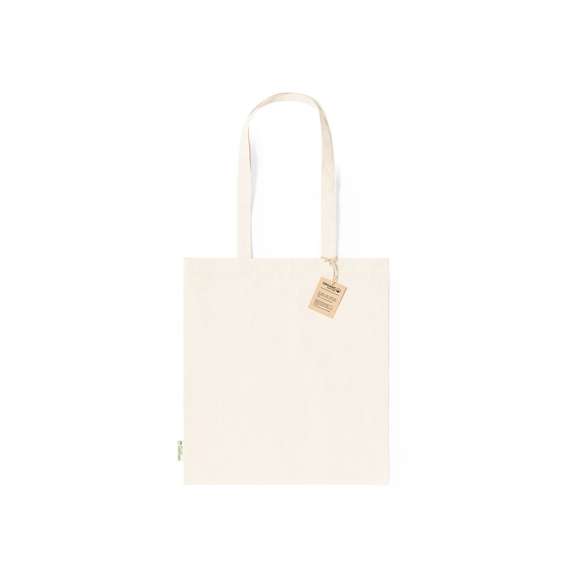 Bolsa fabricada en material100% algodón orgánico de 140g/m2 y en tono natural. Con certificación GOTS (Global Organic Textile Standard, ó Norma Mundial de Textiles Orgánicos) que garantiza que los tejidos están hechos de fibras orgánicas. De acabado cosido, con asas medianas reforzadas de 70 cm. Resistencia hasta 8kg, incluida etiqueta con distintivo de algodón orgánico y hangtag en cartón reciclado.