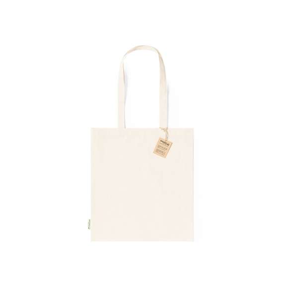 Bolsa fabricada en material100% algodón orgánico de 180g/m2 y en tono natural. Con certificación GOTS (Global Organic Textile Standard, ó Norma Mundial de Textiles Orgánicos) que garantiza que los tejidos están hechos de fibras orgánicas. De acabado cosido, con asas medianas reforzadas de 70 cm. Resistencia hasta 8kg, incluida etiqueta con distintivo de algodón orgánico y hangtag en cartón reciclado.