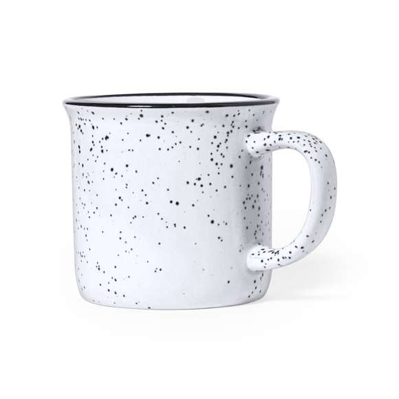 Taza de cerámica de 350ml de capacidad con diseño vintage. En combinación de exterior en colores moteados e interior a juego, con borde negro. Presentada en caja individual acabado kraft.