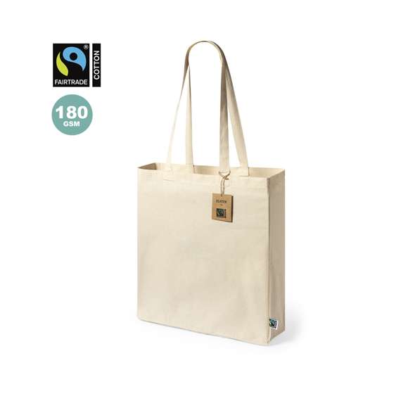 Bolsa de línea nature, fabricada en 100% algodón de 180g/m2 en tono natural. Con certificación Fairtrade (Comercio Justo) un sistema comercial solidario y alternativo al convencional que persigue el desarrollo de los pueblos y la lucha contra la pobreza. De acabado cosido con fuelle, asas largas reforzadas de 70cm y resistencia hasta 7kg de peso. Incluida etiqueta Fairtrade y hangtag distintivo en cartón reciclado.