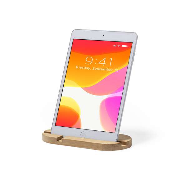Original y sencillo soporte de línea nature para smartphone y tablet. Fabricado en bambú procedente de cortes naturales. Presentado en atractiva caja individual de diseño eco.