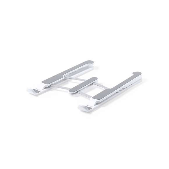 Soporte plegable para portátil. Fabricado en resistente ABS con protecciones antideslizantes en TPR para un firme ajuste al dispositivo. Regulable en altura, con plegado de tamaño compacto y presentado en funda de antelina con cierre de cordón y en caja individual de diseño.