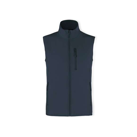Chaleco impermeable y transpirable en combinación de materiales RPET, elaborados a partir de plástico reciclado, para así fomentar la reutilización de residuos plásticos y contribuir a la sostenibilidad del planeta: exterior en soft shell y elastano de 300g/m2 con interior en 100% poliéster microfleece. Con distintivo eco en dobladillo inferior de la prenda.  Resistente al viento y al agua con cierre principal y bolsillos frontal en pecho y laterales de cremallera invisible y tiradores a juego. Disponible en variada gama de colores y en tallas S, M, L, XL, XXL.