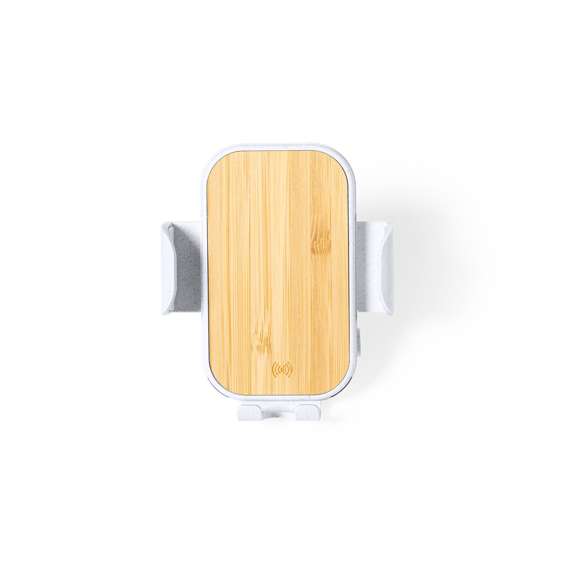 Soporte Cargador Inalámbrico de Coche Limited Edition. Un estilo innovador, donde sostenibilidad, diseño y última tecnología se combinan en una calidad premium. Fabricado en bambú y carcasa en resistente ABS y caña de trigo, para así fomentar la utilización de materias primas naturales y reducir las emisiones contaminantes . Con cargador inalámbrico de 15W. Compatible con dispositivos móviles de carga inalámbrica, con cable cargador USB C de 100 cm y manual de instrucciones en Español e Inglés incluidos.  De la perfecta combinación entre exclusividad y diseño, nace Limited Edition, una colección especial de ideas promocionales de edidición limitada. Un nuevo concepto, inspirado en la fusión de artículos premium con las últimas y más novedosas tendencias y que cuenta con una seleción limitada de unidades, convirtiendo así un regalo en una experiencia única e inolvidable.  Exclusivo estuche de presentación Limited Edition,’, con diseño protegido por derechos de propiedad industrial.  Incluida tarjeta con descripción de Limited Edition en cartón reciclado.
