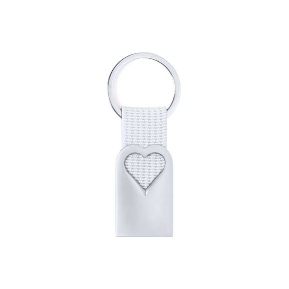 Original llavero corazón con cuerpo en aluminio reciclado de acabado plateado. Cuerpo con corazón troquelado y cinta en color. Amplia superficie de marcaje y distintivo aluminio reciclado. Con anilla llavero metálica a juego y presentado en bolsa individual con cartón kraft.El aluminio reciclado es un material con posibilidades de reciclaje casi infinitas, sin perder sus propiedades originales y consumiendo menos energía en este proceso.