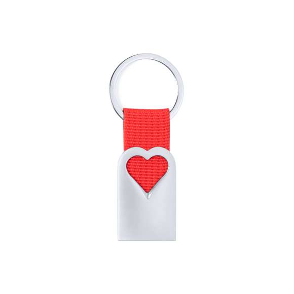 Original llavero corazón con cuerpo en aluminio reciclado de acabado plateado. Cuerpo con corazón troquelado y cinta en color. Amplia superficie de marcaje y distintivo aluminio reciclado. Con anilla llavero metálica a juego y presentado en bolsa individual con cartón kraft.El aluminio reciclado es un material con posibilidades de reciclaje casi infinitas, sin perder sus propiedades originales y consumiendo menos energía en este proceso.